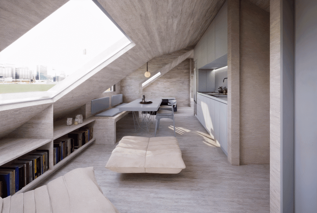 Interior reformado de buhardilla con cocina lineal y comedor junto a ventana inclinada.